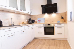 Dorumer Sielhuus 4 - Ferienwohnung mit Garten und Sauna